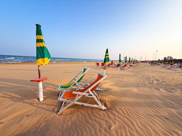 Lignano Sabbiadoro – moře a bazén s tobogány